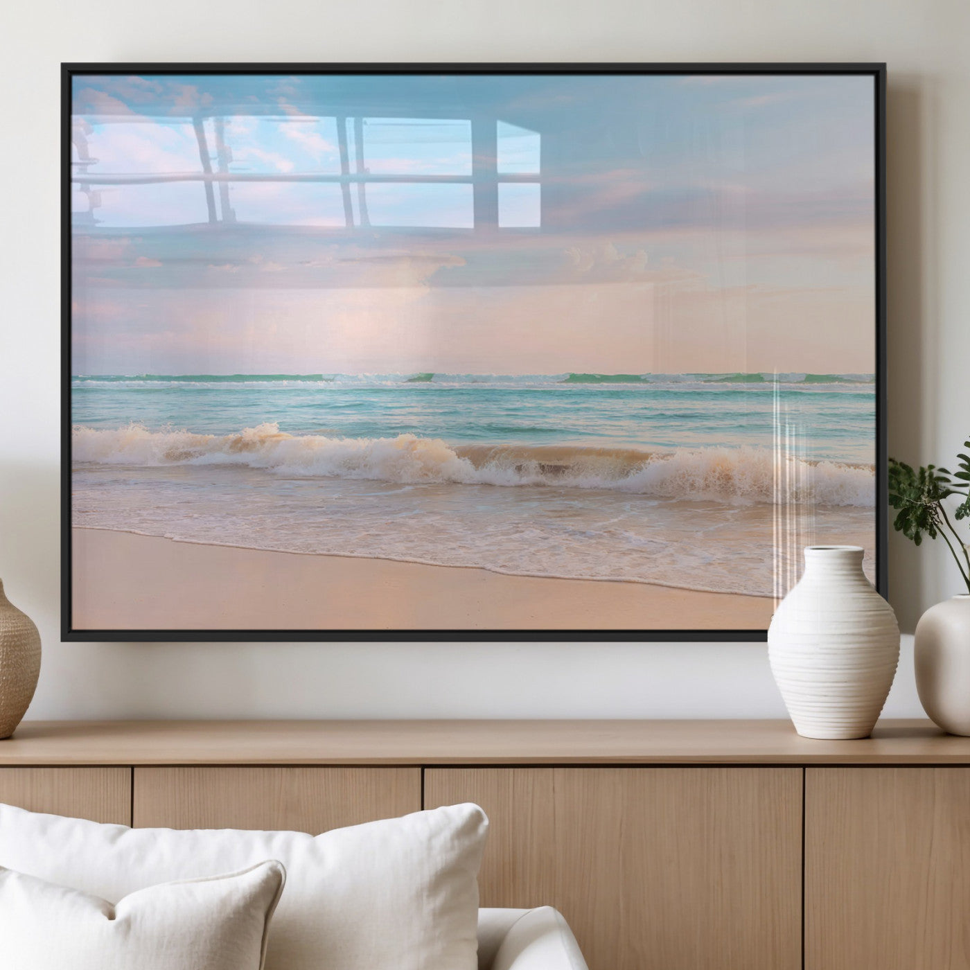 A peaceful beach scene with soft pastel skies, gentle waves washing up on the sandy shore, creating a calm and serene ocean view.