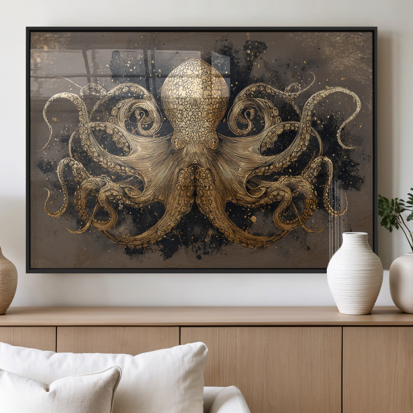 A beautifully detailed illustration of an octopus in gold ink on a textured dark background, with swirling tentacles and intricate patterns.