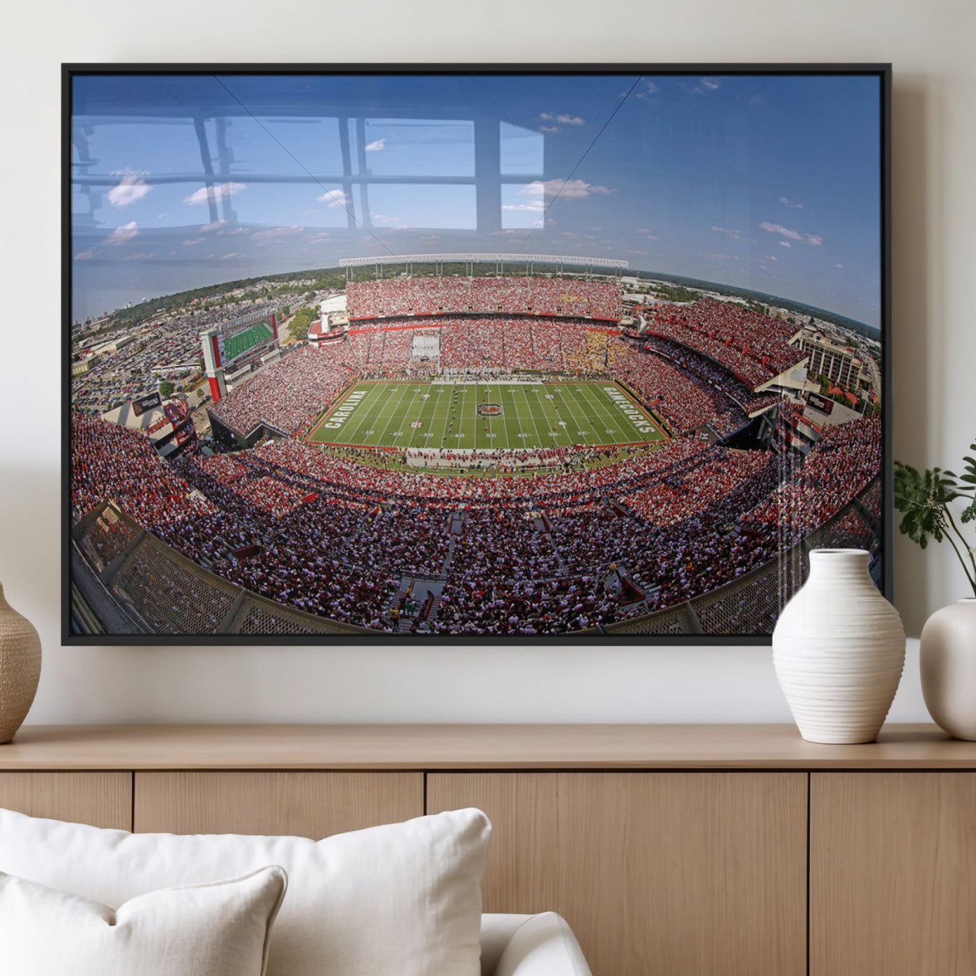 An William Brice-Stadium view of a full football stadium with cheering fans and clear blue skies, capturing the excitement and energy of the game.