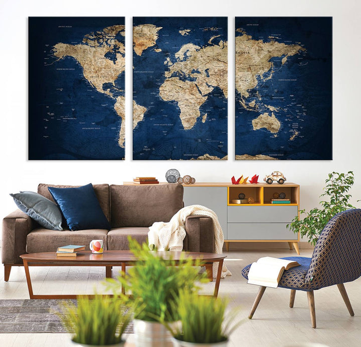 A triptych canvas print titled "Vintage Blue World Map Canvas Print - Classic World Map Design on Deep Blue Wall Art Print" adorns the wall, enhancing the decor with its antique style.