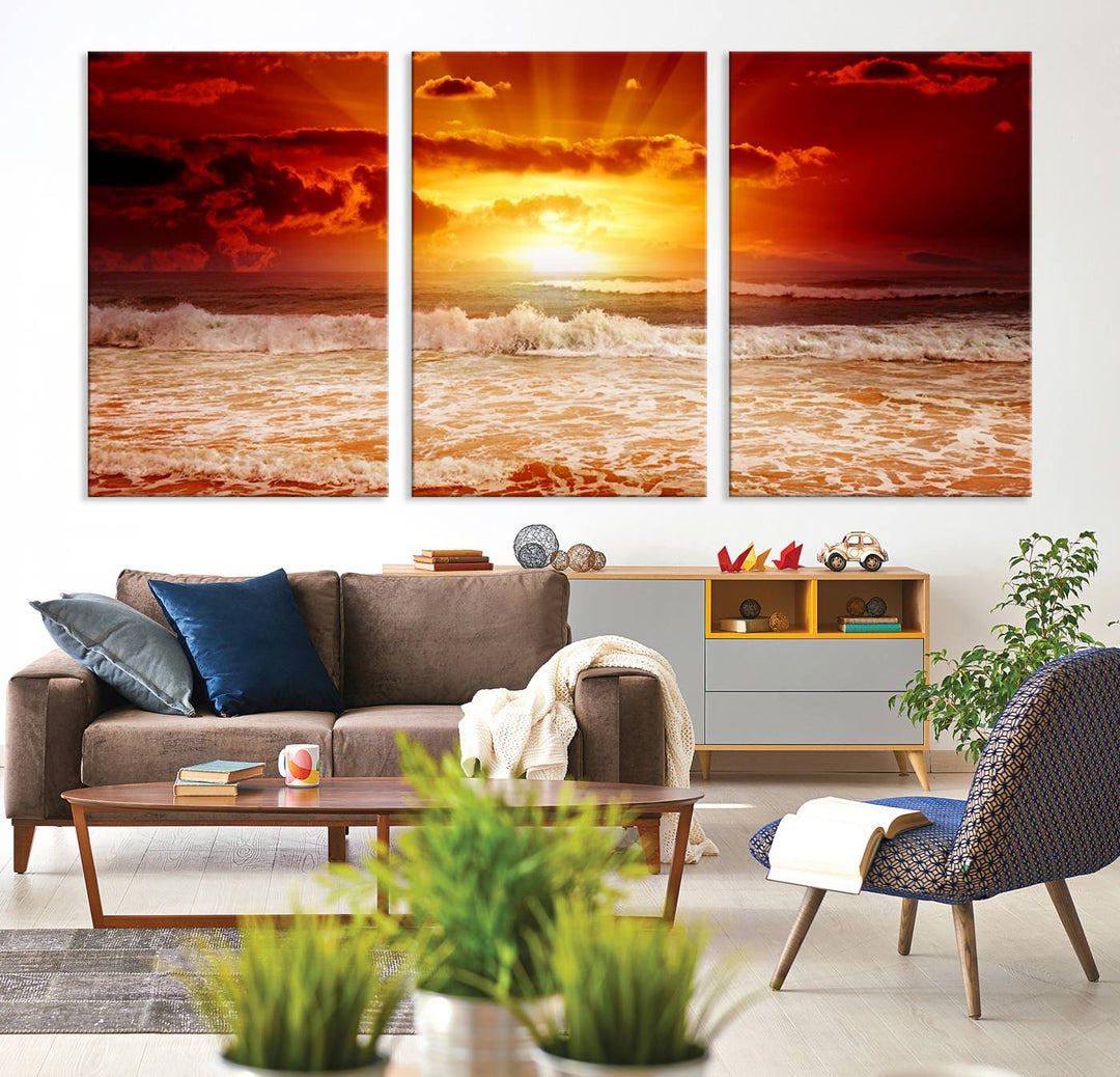 Red Sunset Ocean Beach Canvas Wall Art showcases a stunning three-panel masterpiece that captures a vivid beach sunset over ocean waves.