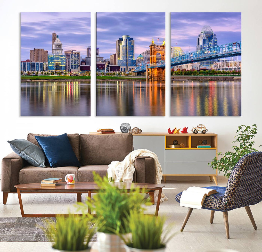 The wall art titled "Cincinnati City Lights Sunset Purple Cloudy Skyline Cityscape View" is beautifully printed on museum-quality canvases with a UV-protective coating and is ready to hang.