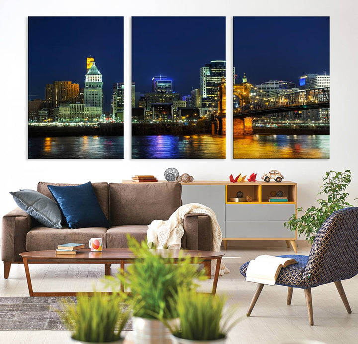 The "Cincinnati City Lights Night Skyline Cityscape" canvas print, displayed above a sofa, exhibits museum-quality craftsmanship with a UV-protective coating.