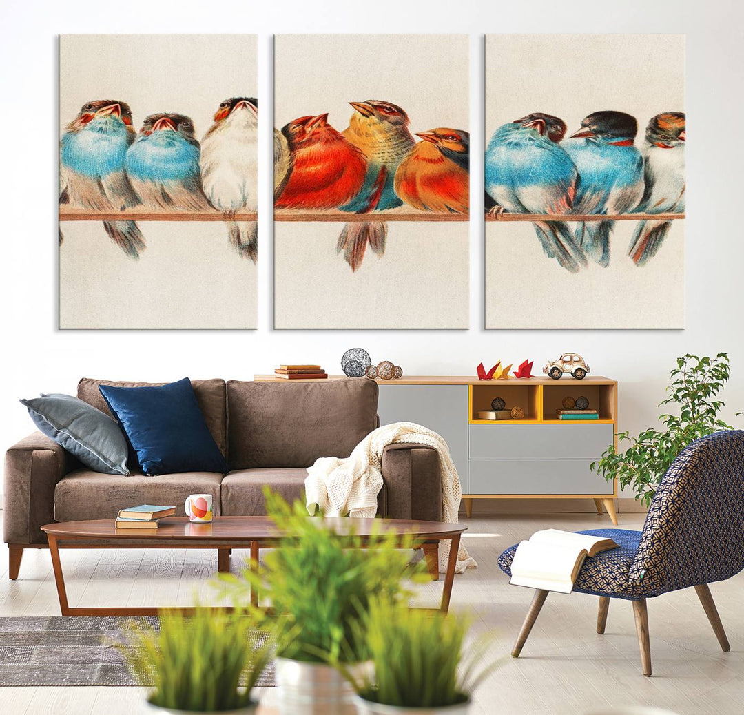 The Abstract Birds Wall Art Canvas Print, featuring a triptych of colorful birds perched on a branch, is printed on museum-quality canvas and equipped with a UV-protective coating and ready-to-hang design. This artwork adds vibrant elegance to your living space.