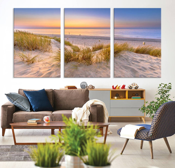 The "Sunset Silence on the Beach" wall art canvas print features a serene beach scene at sunset on museum-quality canvas with a UV-protective coating.