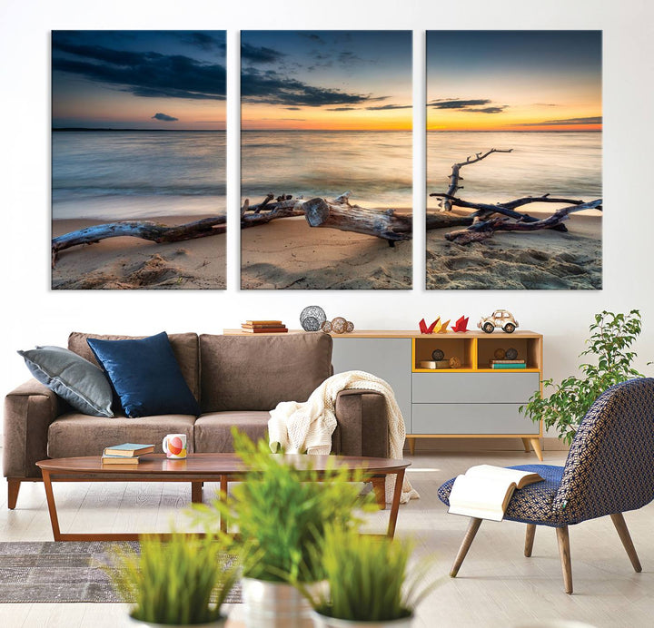 A captivating piece of Ocean Sunset Beach Wall Art Canvas Print, gallery wrapped, graces the gray wall.