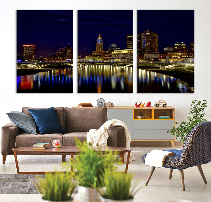 The "Columbus City Lights Night Skyline Cityscape View Wall Art Canvas Print" showcases a stunning city skyline at night, with illuminated buildings and bridges reflecting in the river, on a museum-quality canvas ready to hang.