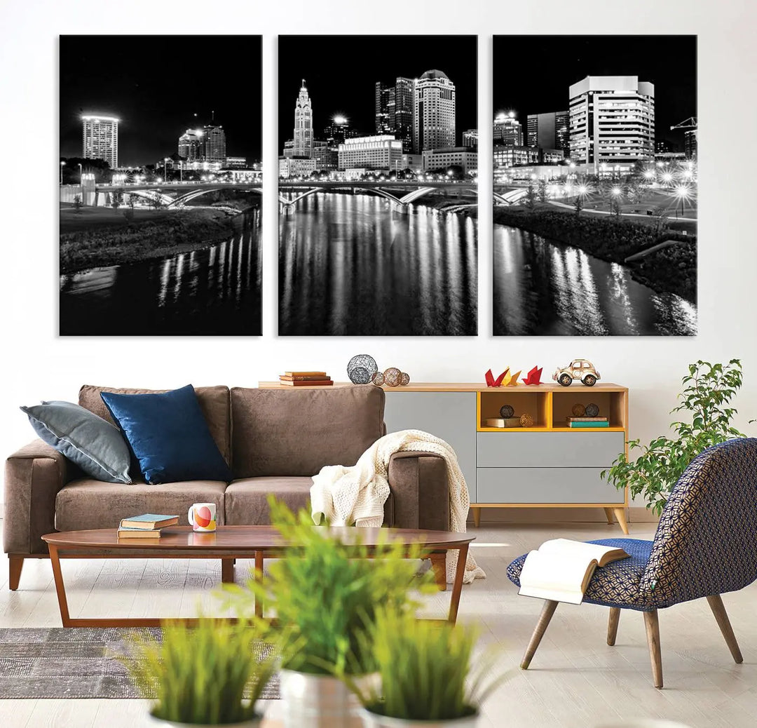 The living room showcases the Columbus City Lights Skyline Black and White Wall Art Cityscape Canvas Print.