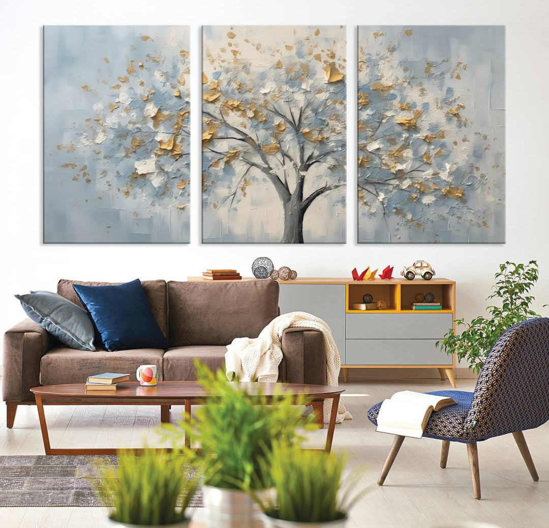 An Abstract Tree Wall Art Canvas Print with textured golden leaves on a blue background is a stunning modern, nature-inspired art piece. This ready-to-hang artwork is perfect for enhancing living room or bedroom decor.