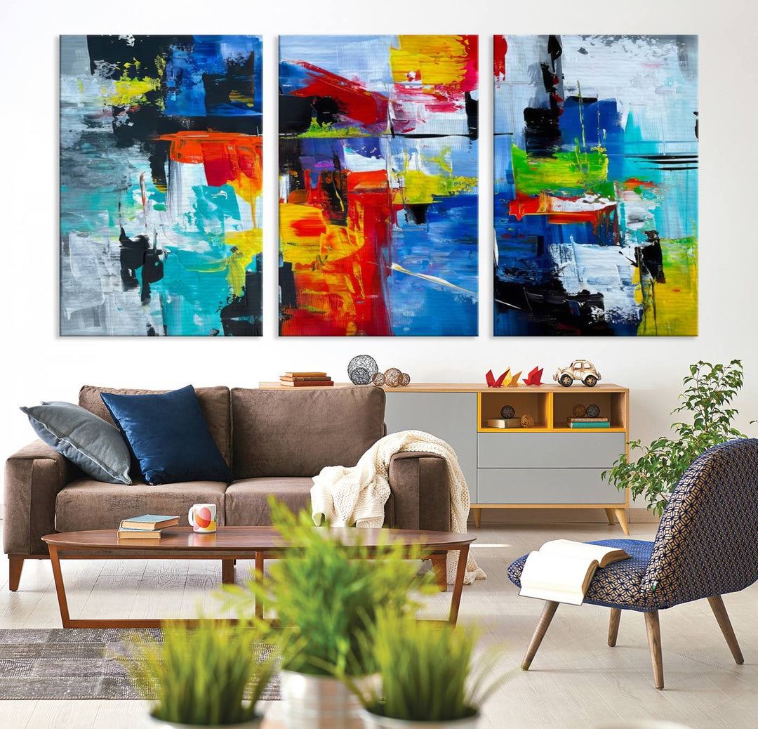 Three Colorful Abstract Wall Art Canvas Prints feature vibrant colors on museum-quality canvas and are finished with a UV-protective coating. Their ready-to-hang design allows for effortless transformation of your space.