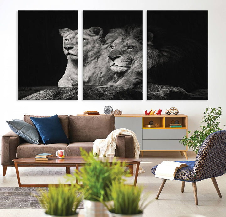 The elegant wildlife portrait, "Lion Couple Canvas Wall Art Print," featuring a black and white depiction of a lion family, majestically decorates the living room wall.