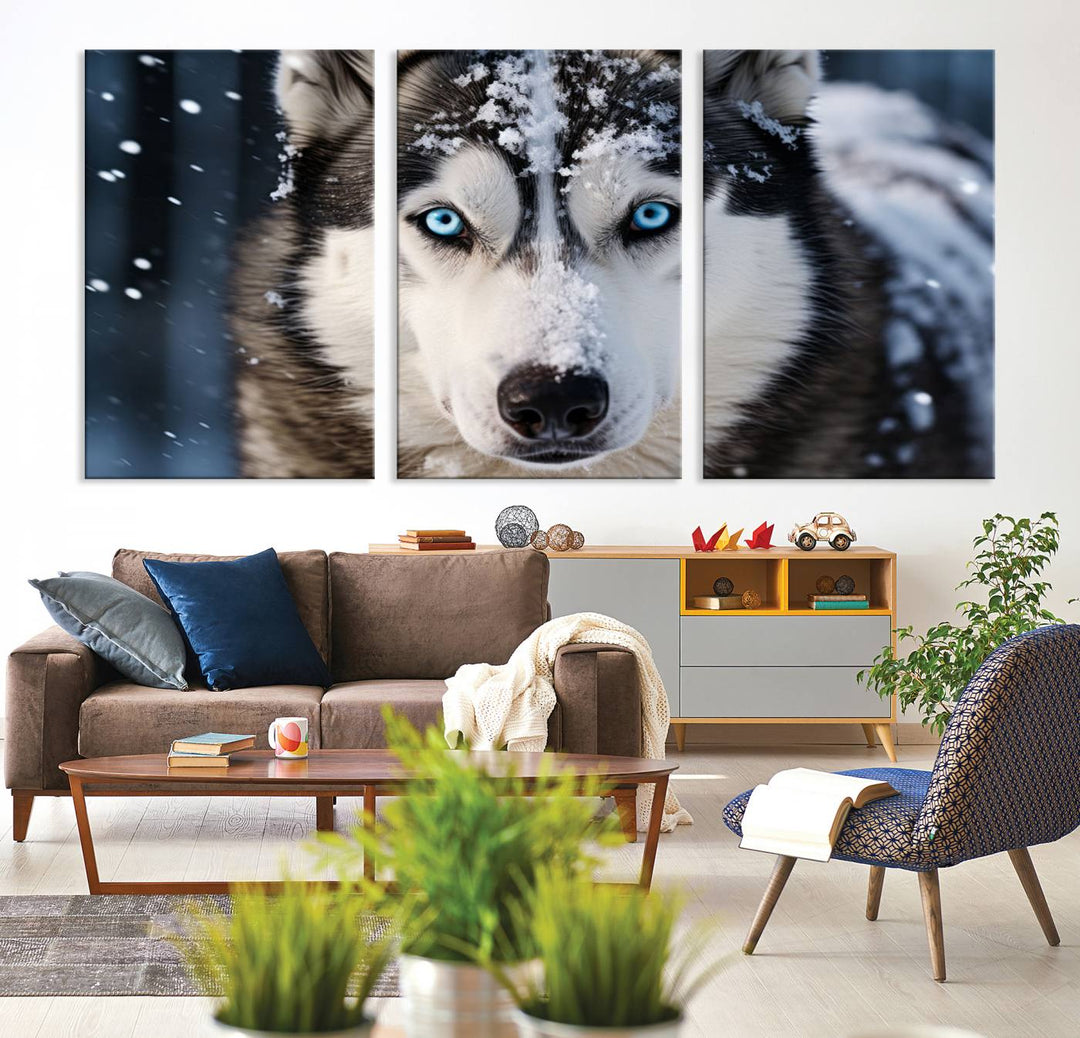 A digital art piece titled "Winter Siberian Husky Wolf Wall Art Canvas Print" showcases a blue-eyed husky blanketed in snow. Printed on high-quality canvas, it is an ideal choice for nature and dog enthusiasts.