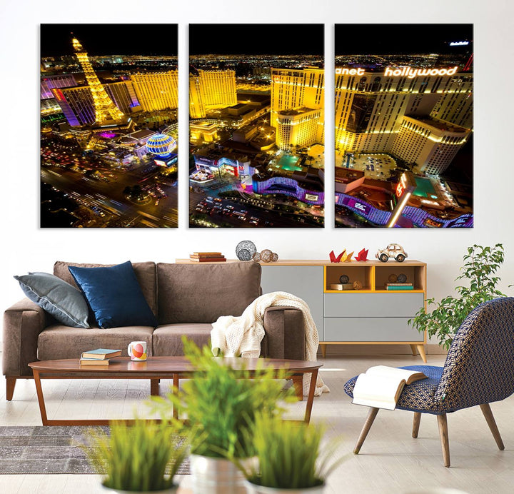 The modern living room features a Las Vegas Wall Art Canvas Print, a museum-quality triptych showcasing a vibrant cityscape with neon lights.