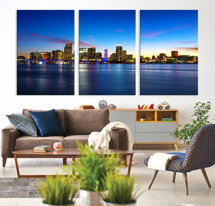 The living room features a Miami City Wall Art Canvas Print—a gallery-wrapped triptych displaying a city skyline at dusk, adding museum-quality elegance to the space.