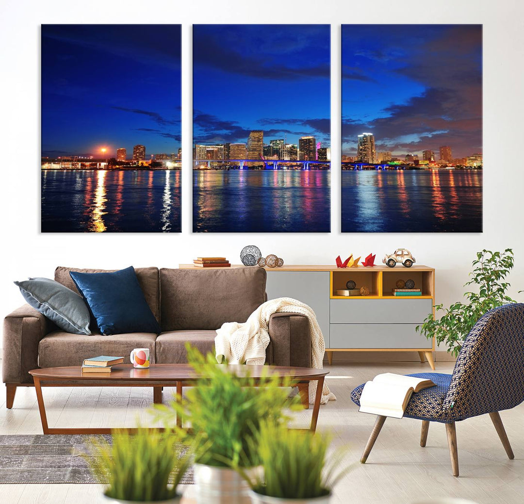 A large Miami City View Wall Art Canvas Print featuring the Miami City Skyline Panorama at night is displayed above the dresser.