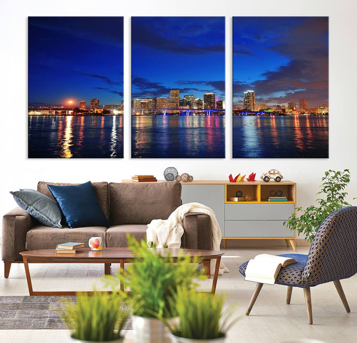 A large Miami City View Wall Art Canvas Print featuring the Miami City Skyline Panorama at night is displayed above the dresser.