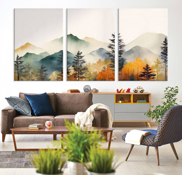 The Abstract Watercolor Mountains and Trees Autumn Wall Art, crafted on museum-quality canvas, decorates the space with its stunning triptych design. This wall art features autumn-colored mountains and trees, expertly gallery wrapped for a seamless and elegant addition to your living room.