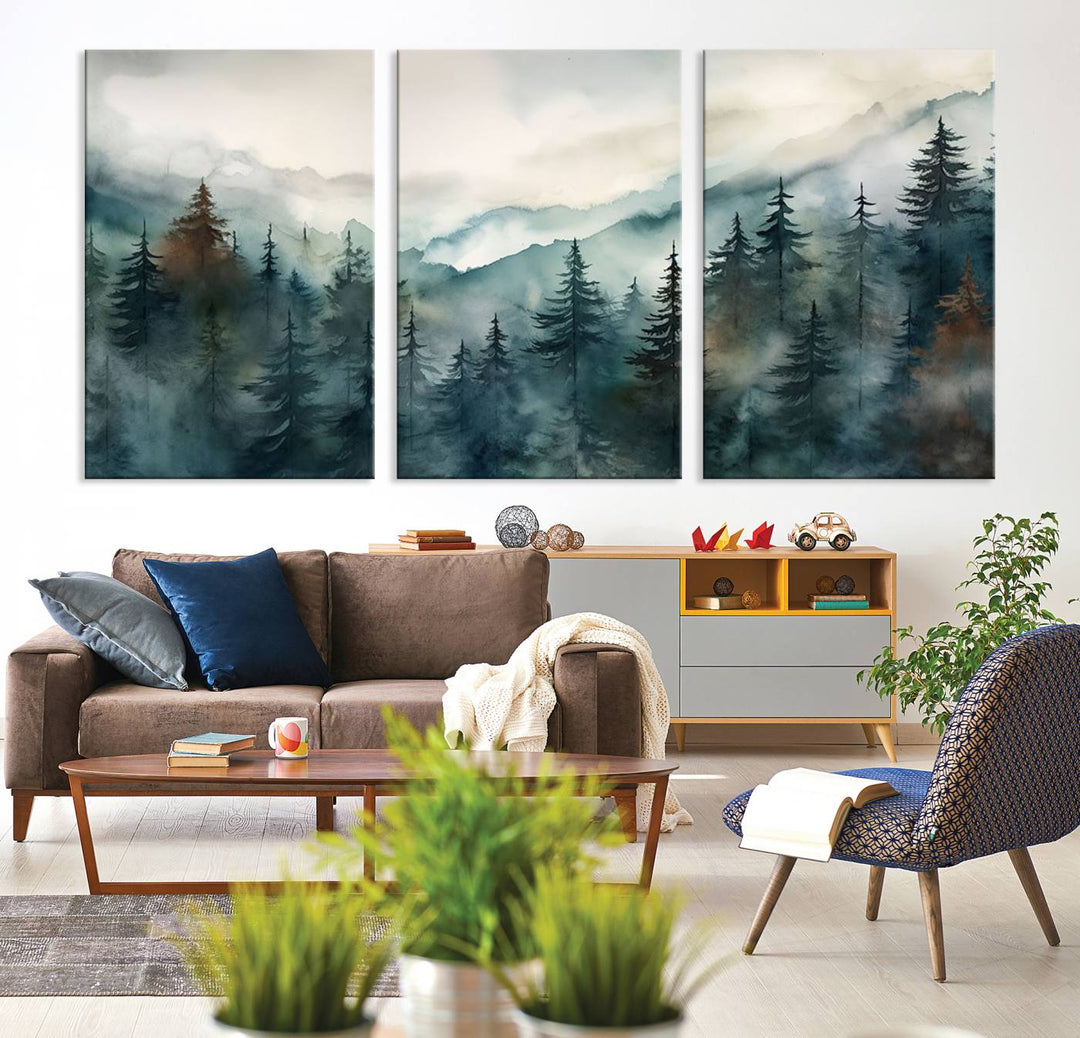 A set of Serenity Forest Wall Art Canvas prints, showcasing foggy mountain landscapes, is displayed in the living room.