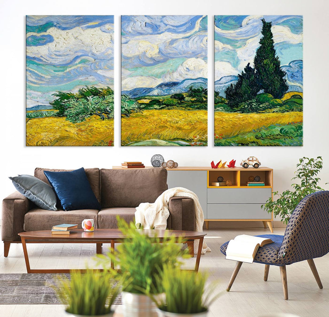 A contemporary living room features a large triptych of "Wheatfield With Cypresses By Van Gogh Painting Wall Art Canvas Print." Crafted on museum-quality canvas, this artwork brings a sense of elegance and craftsmanship reminiscent of professional artistry.