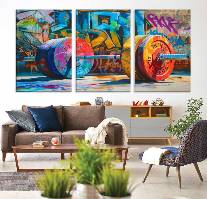 The Fitness Gym Barbell Graffiti Wall Art Canvas Print, a vibrant triptych featuring a barbell against a graffiti backdrop, elegantly hangs in the room. Crafted on premium canvas with a gallery-quality finish, this stunning piece of wall art effortlessly combines urban flair with sophisticated decor.