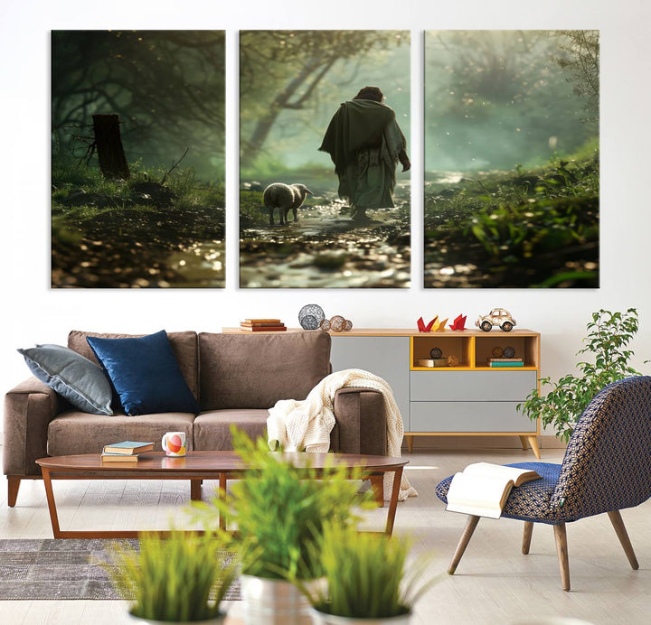 The wall art piece, titled "Jesus Shepherd a Lost Lamb Canvas Wall Art Print," is suspended on the wall and depicts a robed figure and a lamb wandering along a forest path.