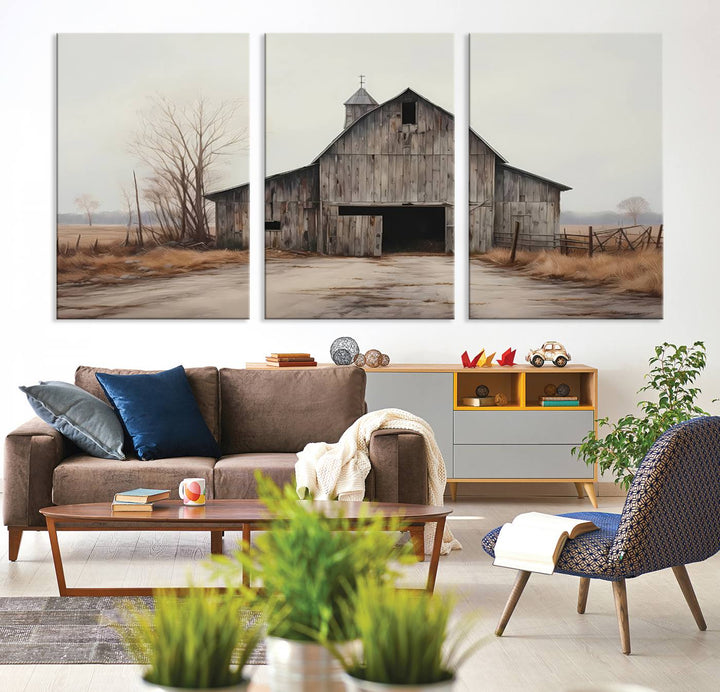 A framed and ready-to-hang Farmhouse Rustic Barn Wall Art Canvas Print is displayed against a gray wall. This stylish modern living room seamlessly combines rural life wall décor with contemporary comfort.