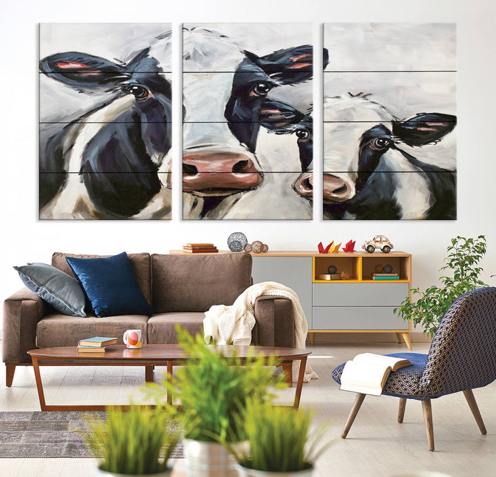 The Vintage Baby and Mom Cattle Wall Art Canvas Print is prominently displayed, adding a touch of contemporary and farmhouse decor to the modern living room.