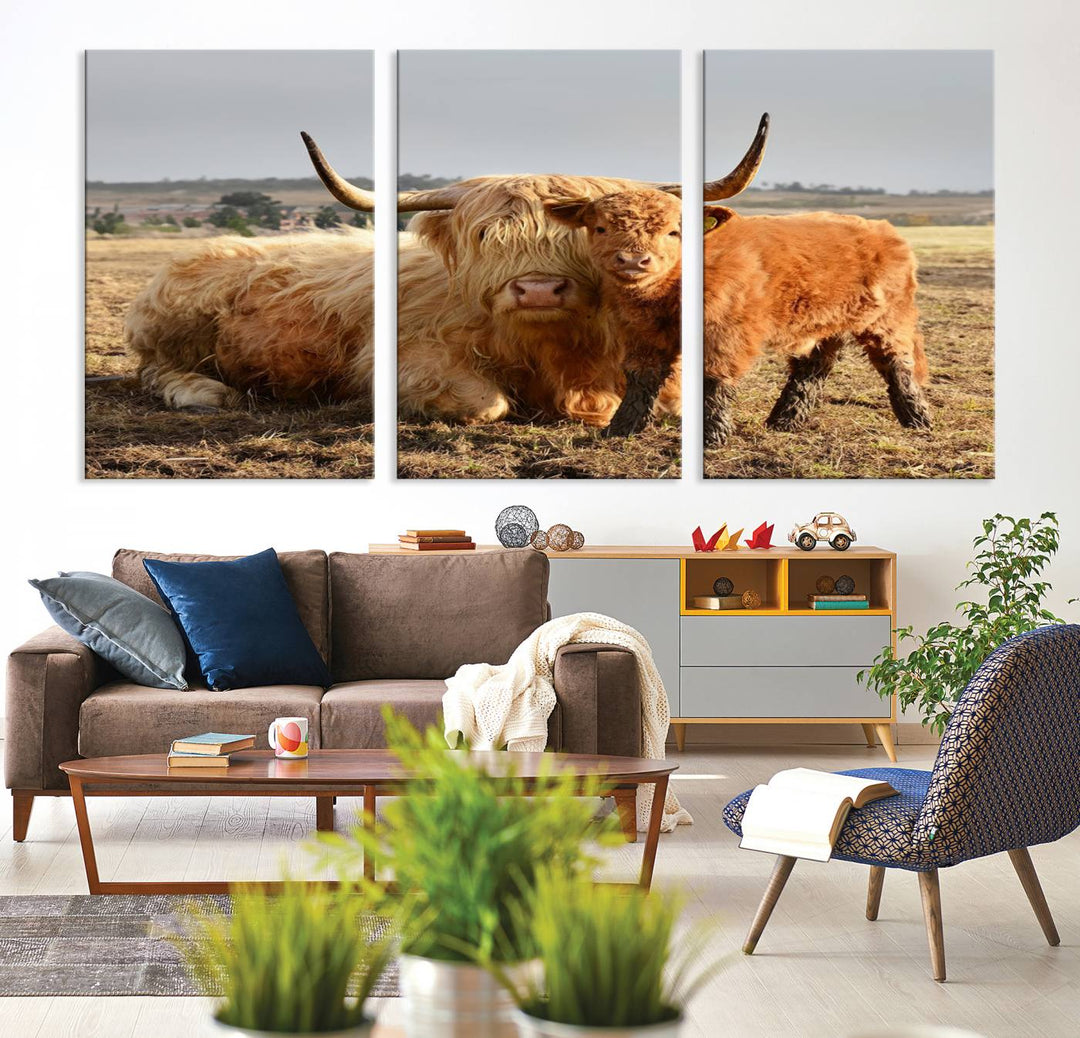 The three-panel canvas artwork, titled "Highland Cow Canvas Wall Art Animal Print for Farm House Decor," features a serene scene of a resting Highland cow and calf in a field. The piece highlights its gallery-quality finish.