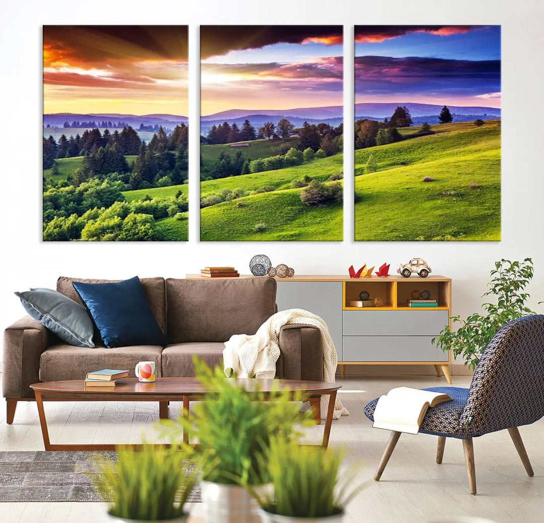 The room features a large triptych of the Green Hills and Sunset Wall Art Print, showcasing a scenic landscape with lush greenery and a vibrant sky.