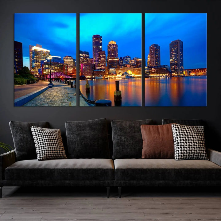 A triptych of the "Boston City Lights Night Blue Skyline Cityscape View Wall Art Canvas Print" adorns the wall. This museum-quality canvas artwork is ready to hang and includes a UV-protective coating for lasting brilliance.