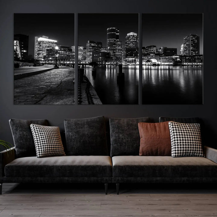 The Boston City Lights Skyline Black and White Wall Art Cityscape Canvas Print portrays a triptych of the city skyline at night reflecting on a calm river. This museum-quality canvas features UV-protective finishes to preserve its timeless allure.