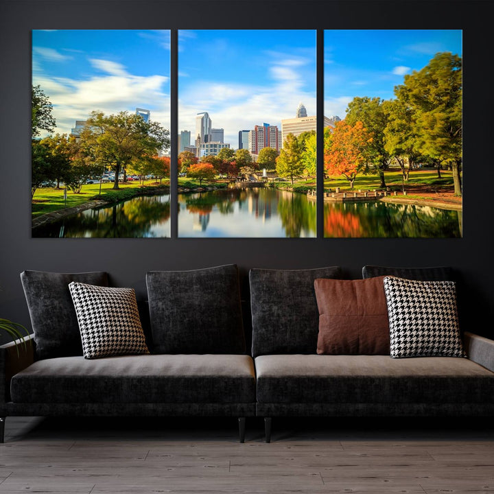 The Charlotte City Park at Spring Skyline Cityscape View wall art canvas print is a triptych featuring a scenic park with a lake and city skyline. It is gallery-wrapped on museum-quality canvases.