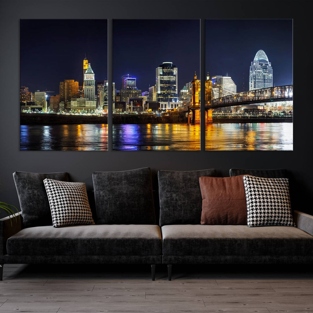 The Cincinnati City Lights Night Skyline Cityscape View Wall Art Canvas Print, crafted on museum-quality canvas with UV-protective coating and ready to hang, adds a touch of sophistication to the wall.