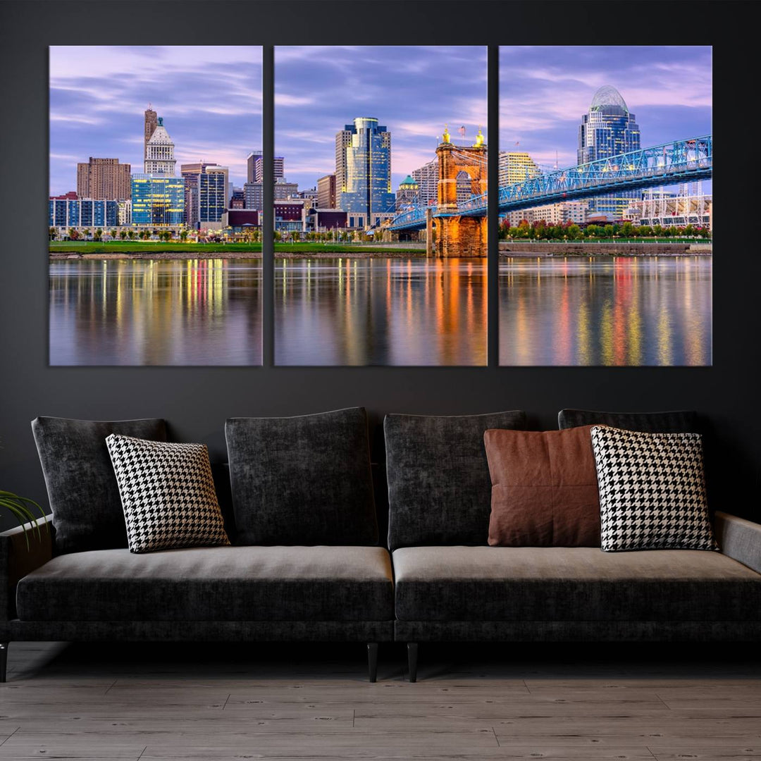 The wall art titled "Cincinnati City Lights Sunset Purple Cloudy Skyline Cityscape View" is beautifully printed on museum-quality canvases with a UV-protective coating and is ready to hang.