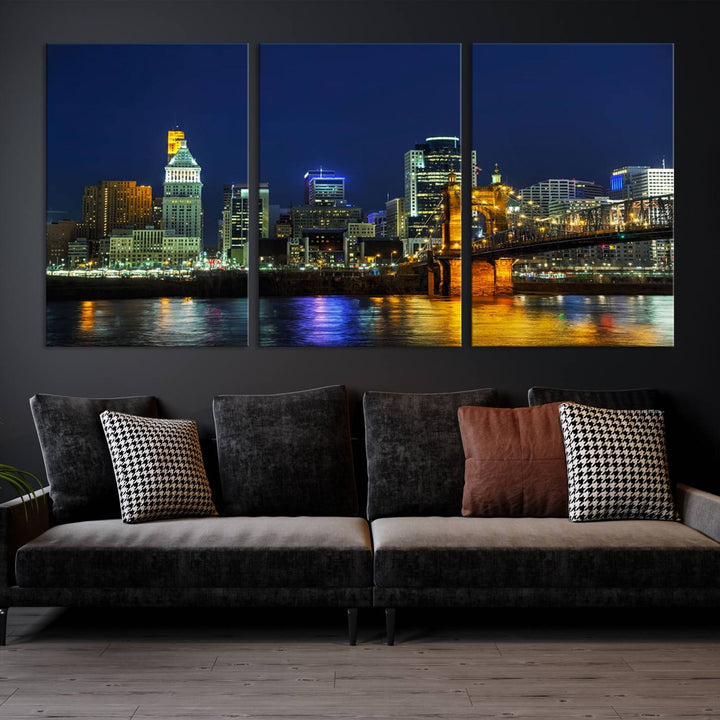 The "Cincinnati City Lights Night Skyline Cityscape" canvas print, displayed above a sofa, exhibits museum-quality craftsmanship with a UV-protective coating.