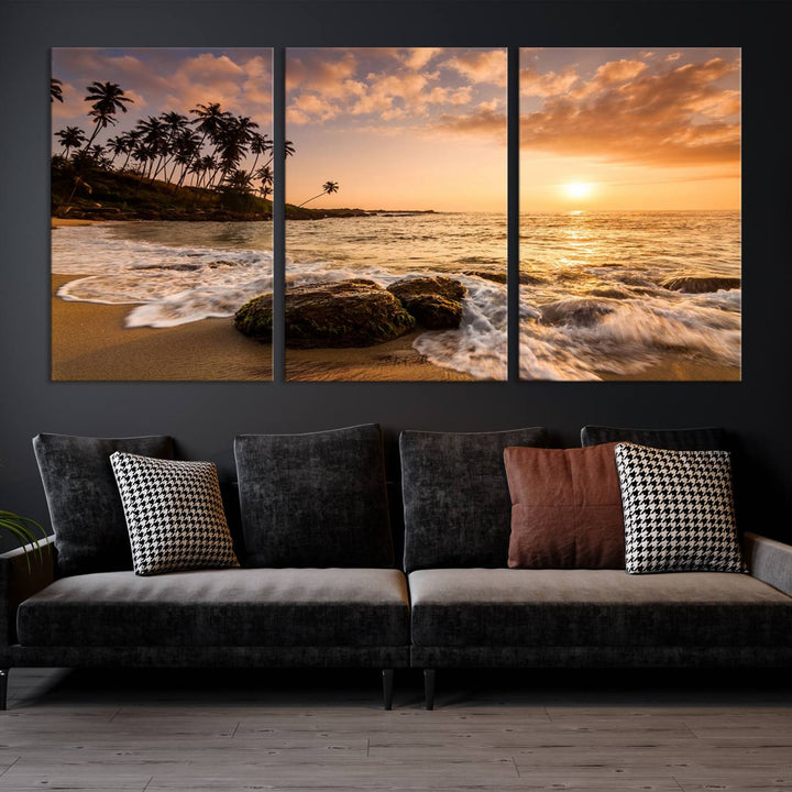 The "Tropical Island Sunset Sunrise Wall Art Canvas Print" is a stunning triptych that showcases a tranquil beach sunset complete with waves and palm trees. Each canvas piece is meticulously hand-assembled and framed using museum-quality polycotton with a UV-protective coating to ensure enduring beauty.