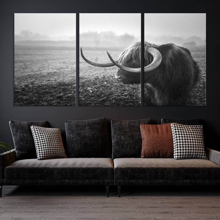 The living room features a three-panel wall art of a highland cow in a foggy field, using the Cow Wall Art Canvas Print for visual impact. This museum-quality canvas includes UV-protective coating to ensure longevity.