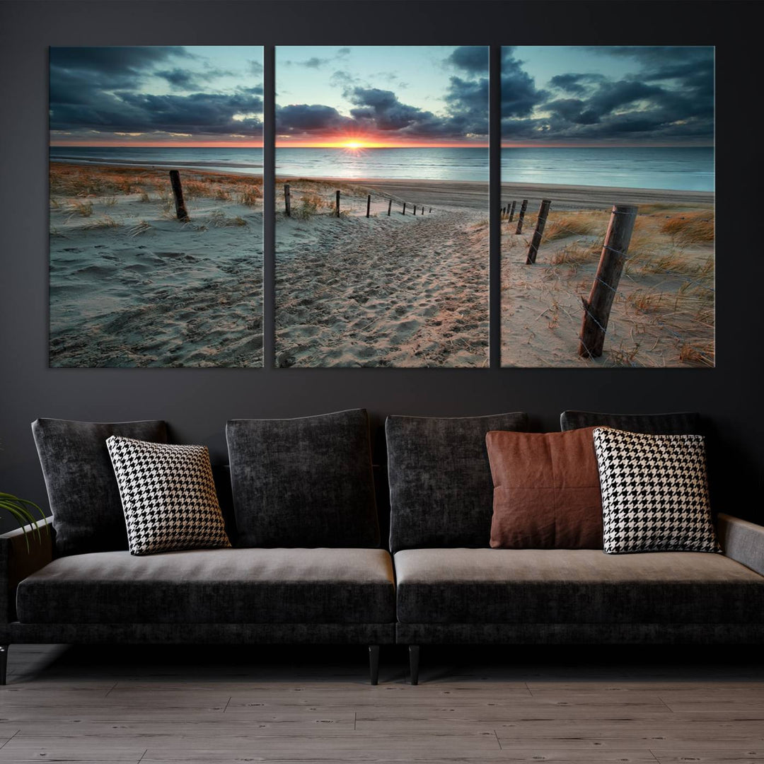 The modern living room features the Cloudy Weather Sunset Beach Wall Art Canvas Print. This museum-quality canvas adds a touch of sophistication with its hand-assembled framed art, ensuring lasting elegance. Enjoy free shipping on this exquisite piece.