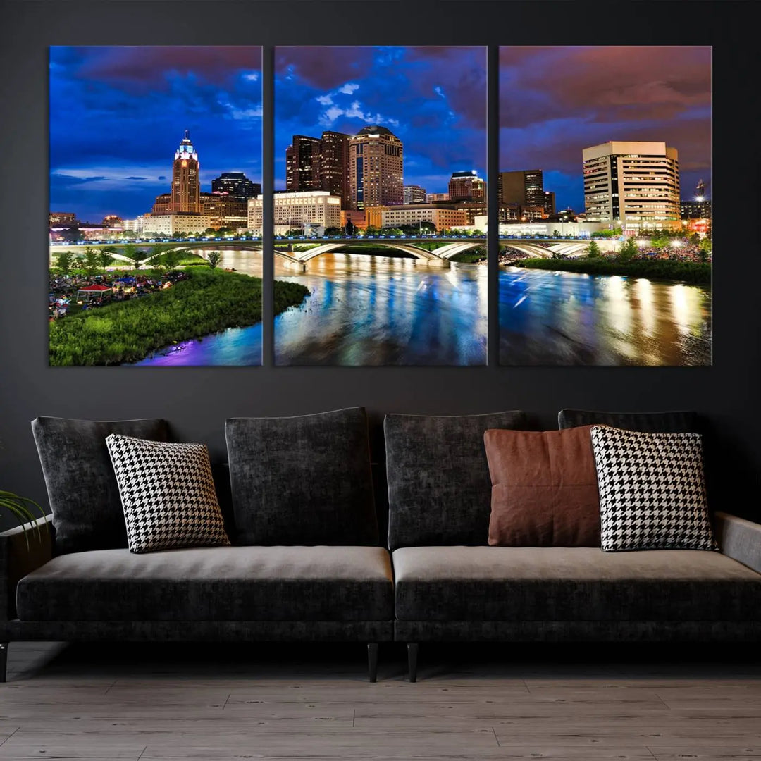 Columbus City Lights Night Bright Blue Cloudy Skyline Cityscape View Wall Art Canvas Print, gallery wrapped on museum-quality canvas, reflecting on a river.