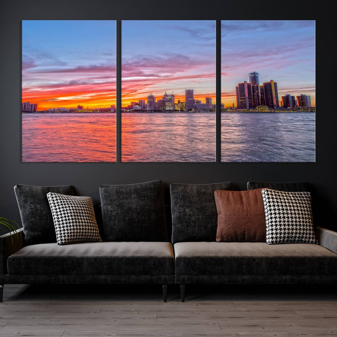 The Detroit City Lights Sunset Colorful Cloudy Skyline Cityscape View Wall Art Canvas Print showcases a vibrant city skyline at sunset over water. The artwork is museum-quality, comes ready to hang, and features a UV-protective coating to preserve its vivid colors.