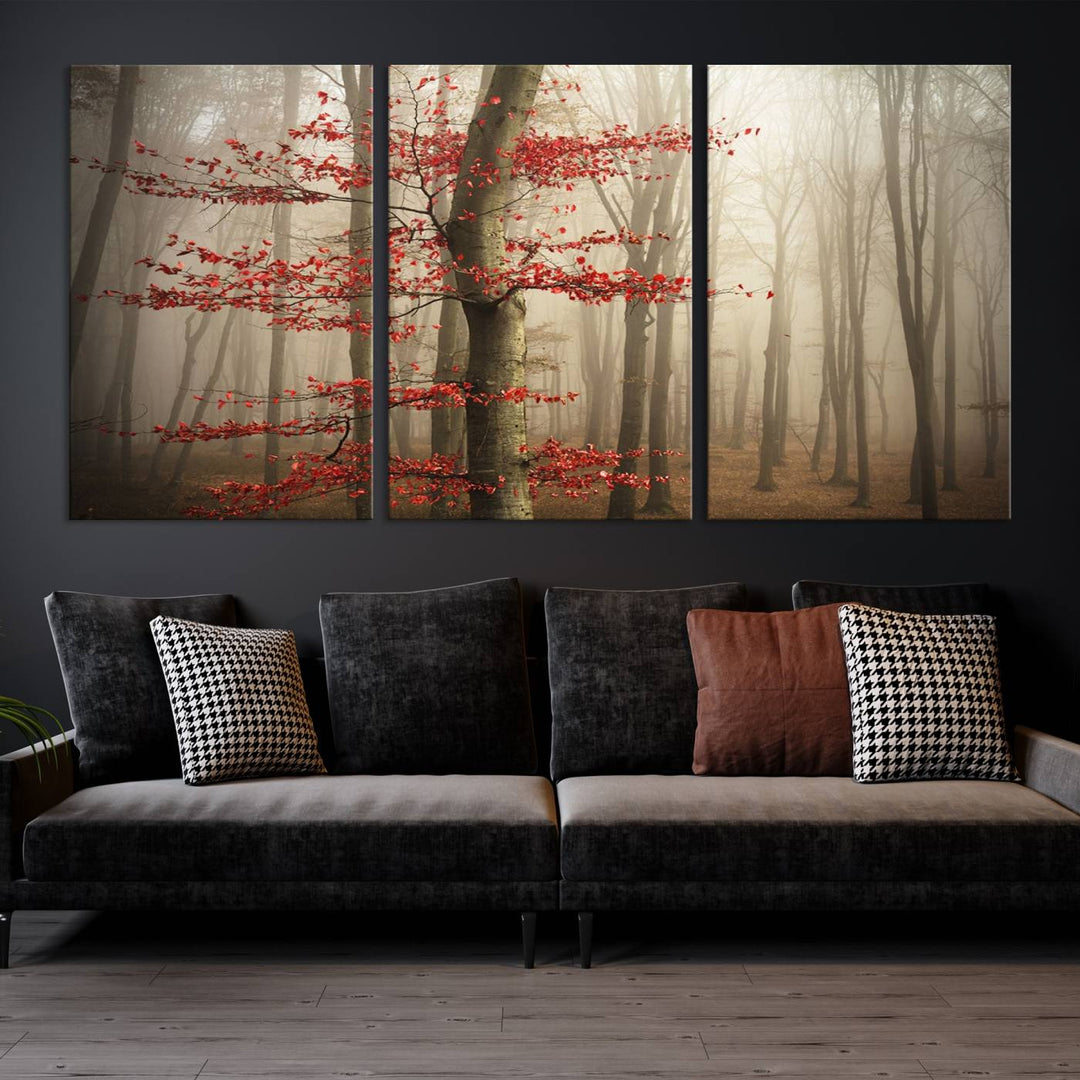 The living room features the Foggy Forest Wall Art, an Autumn Trees Canvas Print that showcases a serene nature scene with foggy woodland decor and a tree adorned in vibrant red leaves.