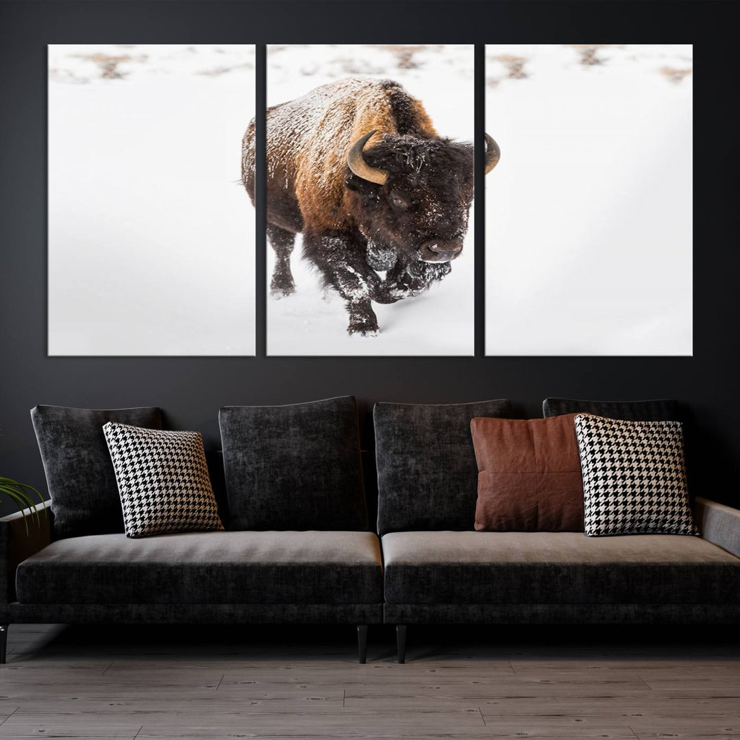 The Bison Winter Wall Art Canvas Print for Farmhouse Decor is displayed as a triptych in the living room. This artwork, printed on museum-quality canvases with a UV-protective coating to maintain its vibrant colors, is the focal point of the space.