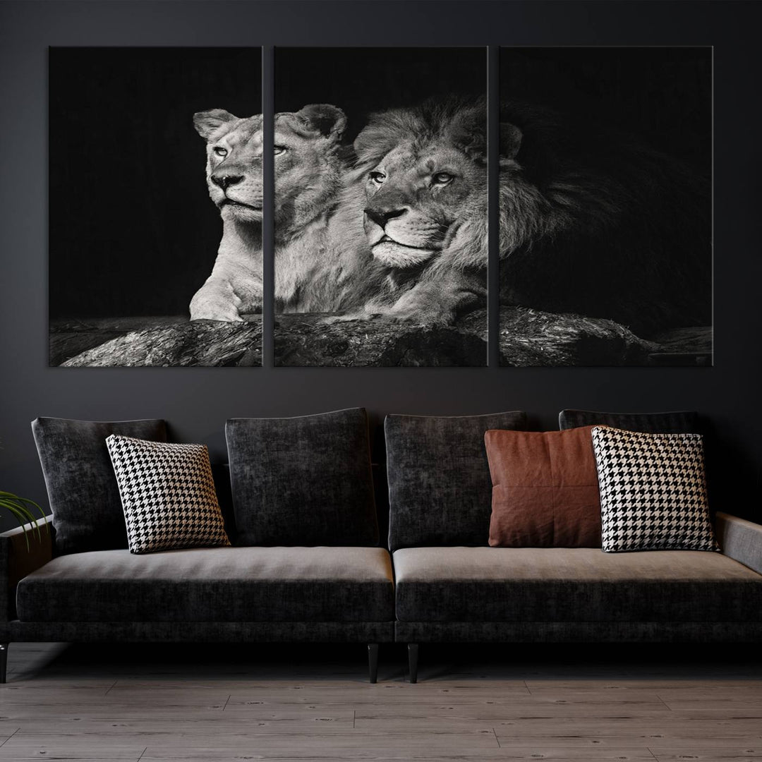 The elegant wildlife portrait, "Lion Couple Canvas Wall Art Print," featuring a black and white depiction of a lion family, majestically decorates the living room wall.