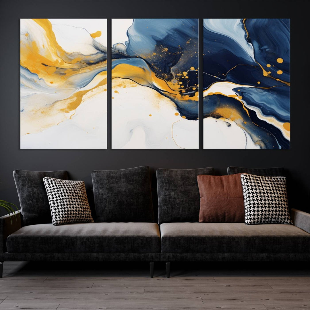 The Blue and Gold Abstract Fluid Canvas Art, with its swirling patterns, adorns the wall. This modern wall art beautifully complements the contemporary interior decor, adding an elegant touch with its rich blue, gold, and white tones.