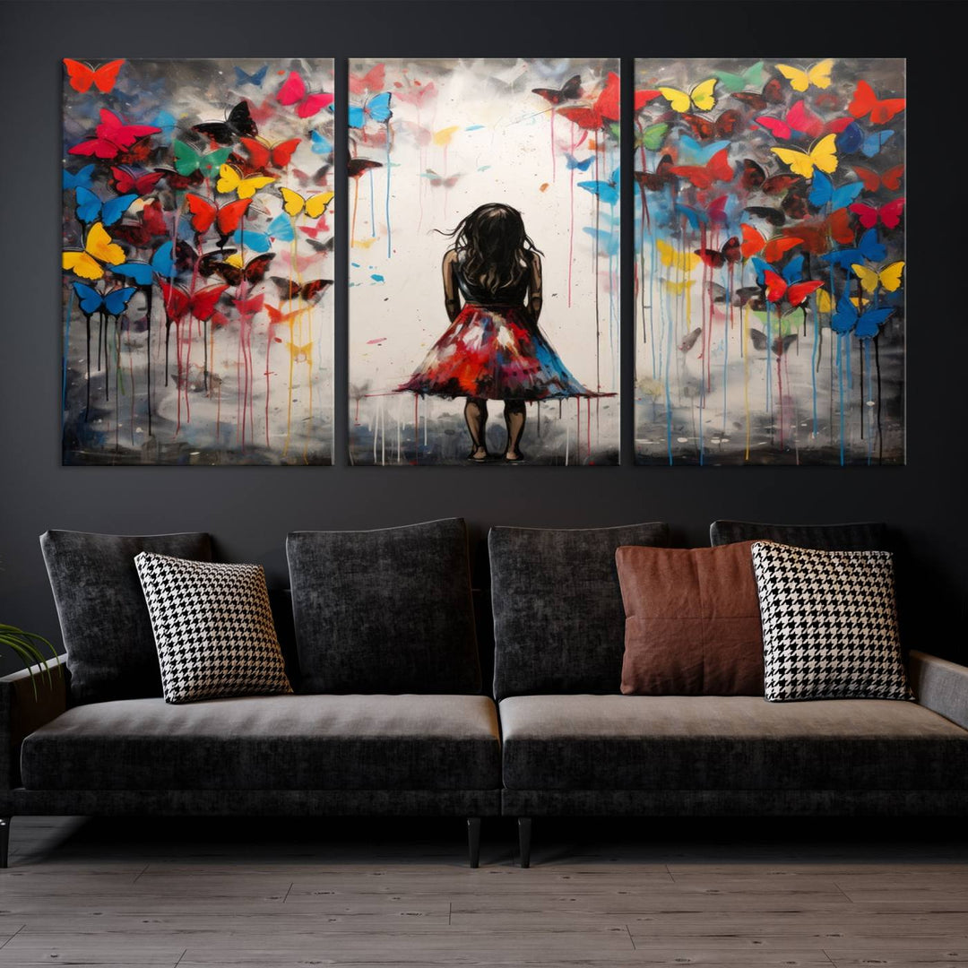 The Girl Butterfly Graffiti Abstract Canvas Print, featuring a vibrant depiction of a girl surrounded by butterflies on museum-quality canvas, is displayed prominently.