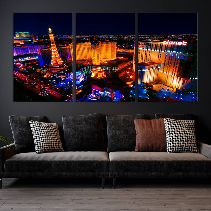 Las Vegas Wall Art Canvas Print showcases a dynamic and luminous cityscape at night with tall buildings and bustling streets. Expertly printed on museum-quality canvas, this gallery-wrapped artwork is enhanced with a UV-protective coating to ensure lasting brilliance.