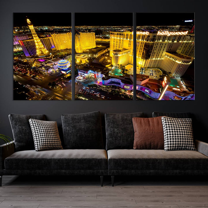 The modern living room features a Las Vegas Wall Art Canvas Print, a museum-quality triptych showcasing a vibrant cityscape with neon lights.