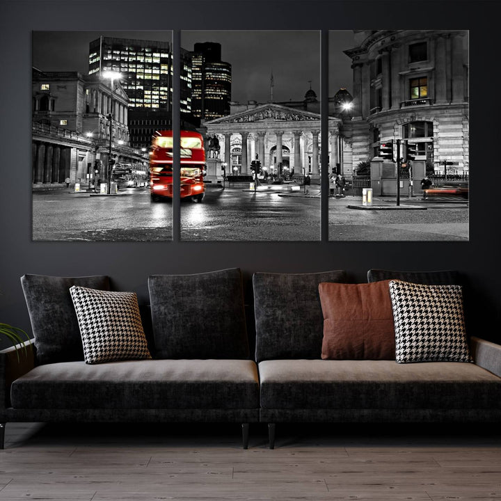 The London Night Red Bus Wall Art Canvas Print features a black and white cityscape with a moving red double-decker bus, crafted on museum-quality canvas with a UV-protective coating. This ready-to-hang artwork is designed to stand out and enhance any space.