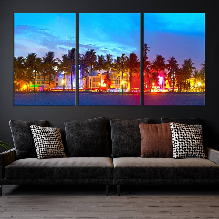 The living room features a three-panel Miami City Wall Art Canvas Print, showcasing a colorful, illuminated beach scene with palm trees on museum-quality canvas.