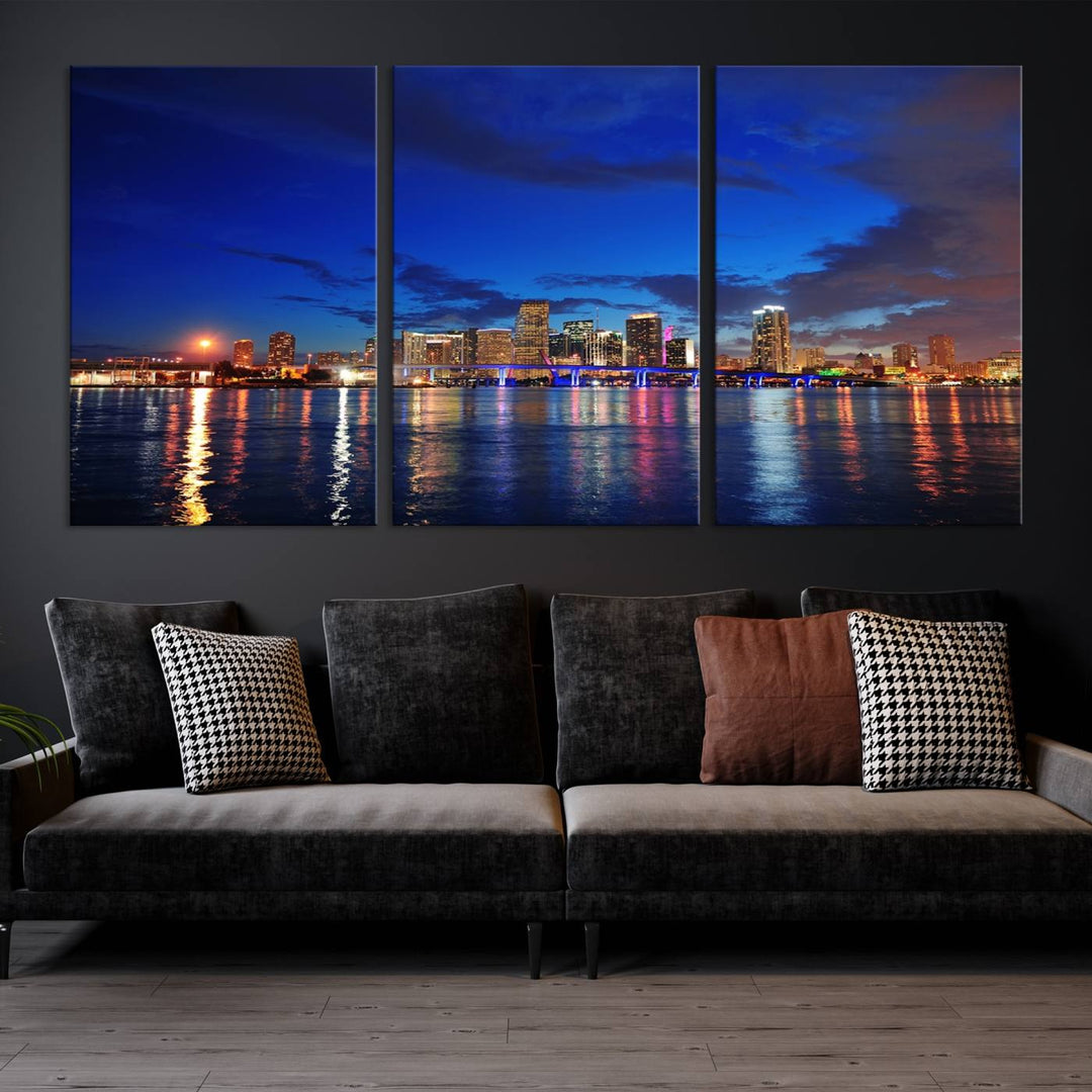 A large Miami City View Wall Art Canvas Print featuring the Miami City Skyline Panorama at night is displayed above the dresser.